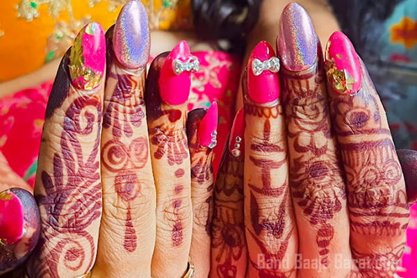 Makeovers by Gunishka haldi stone nail art